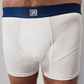 male model wearing confident male's white underwear short boxer briefs with navy band and dribble guard technology wicking layers for men who suffer from benign prostatic hyperplasia or bph
